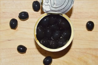 Picture of canned, black olives.